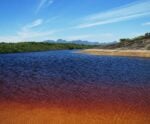 Descubra a Lagoa da Coca-Cola, um paraíso de águas escuras no ES