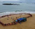 Nadada Rosa acontece domingo (20) na Praia de Itapuã, em Vila Velha