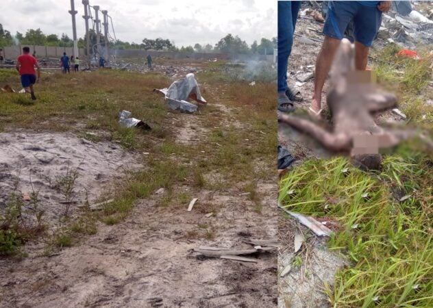 A imagem enviada mostra uma área com sinais evidentes de destruição, provavelmente causada por uma explosão. À esquerda, é possível ver pessoas caminhando entre os destroços, com estruturas metálicas retorcidas ao fundo e fumaça ainda presente no local. À direita, há uma imagem forte e sensível: o corpo de uma vítima visivelmente carbonizada, indicando a gravidade do incidente.
