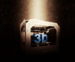 A foto mostra impressora 3D